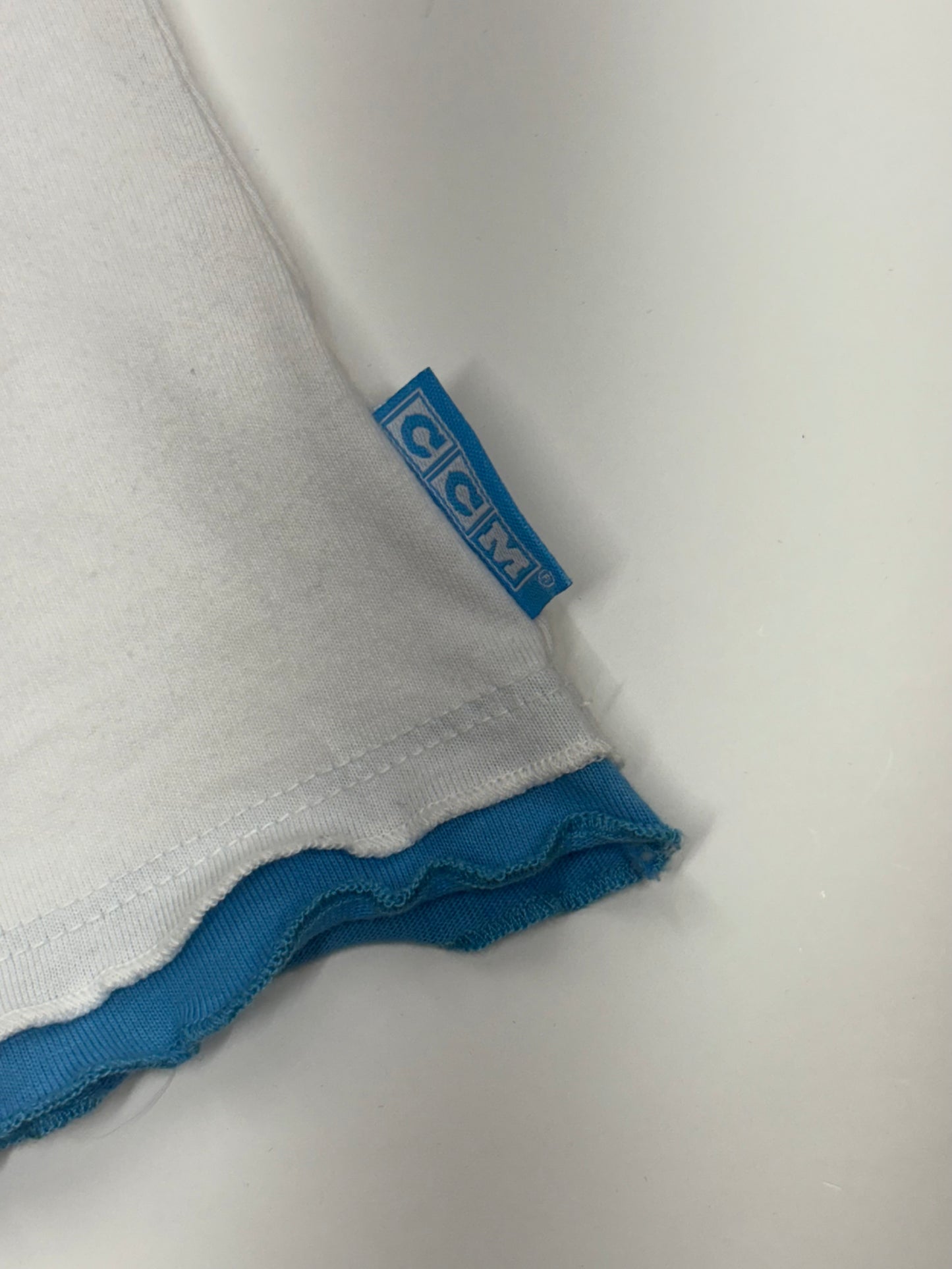 Angel embroidered CCM tee